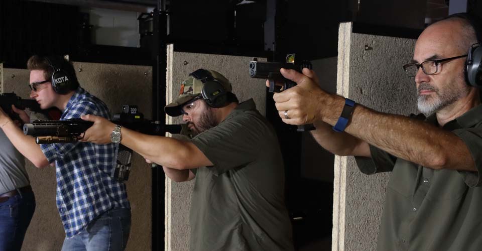 guys in a row on the range